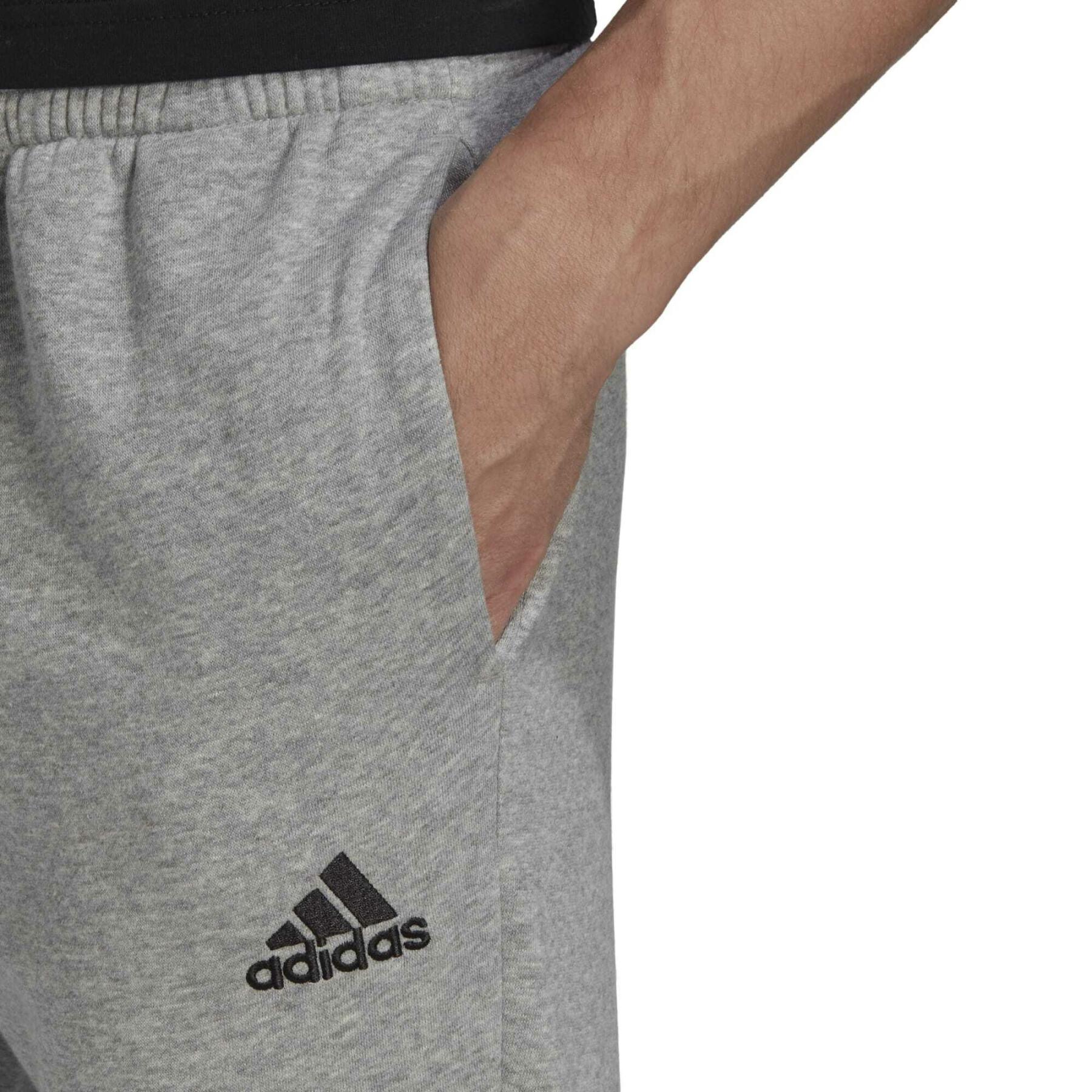 Flared Jogginganzug aus Fleece adidas Essentials