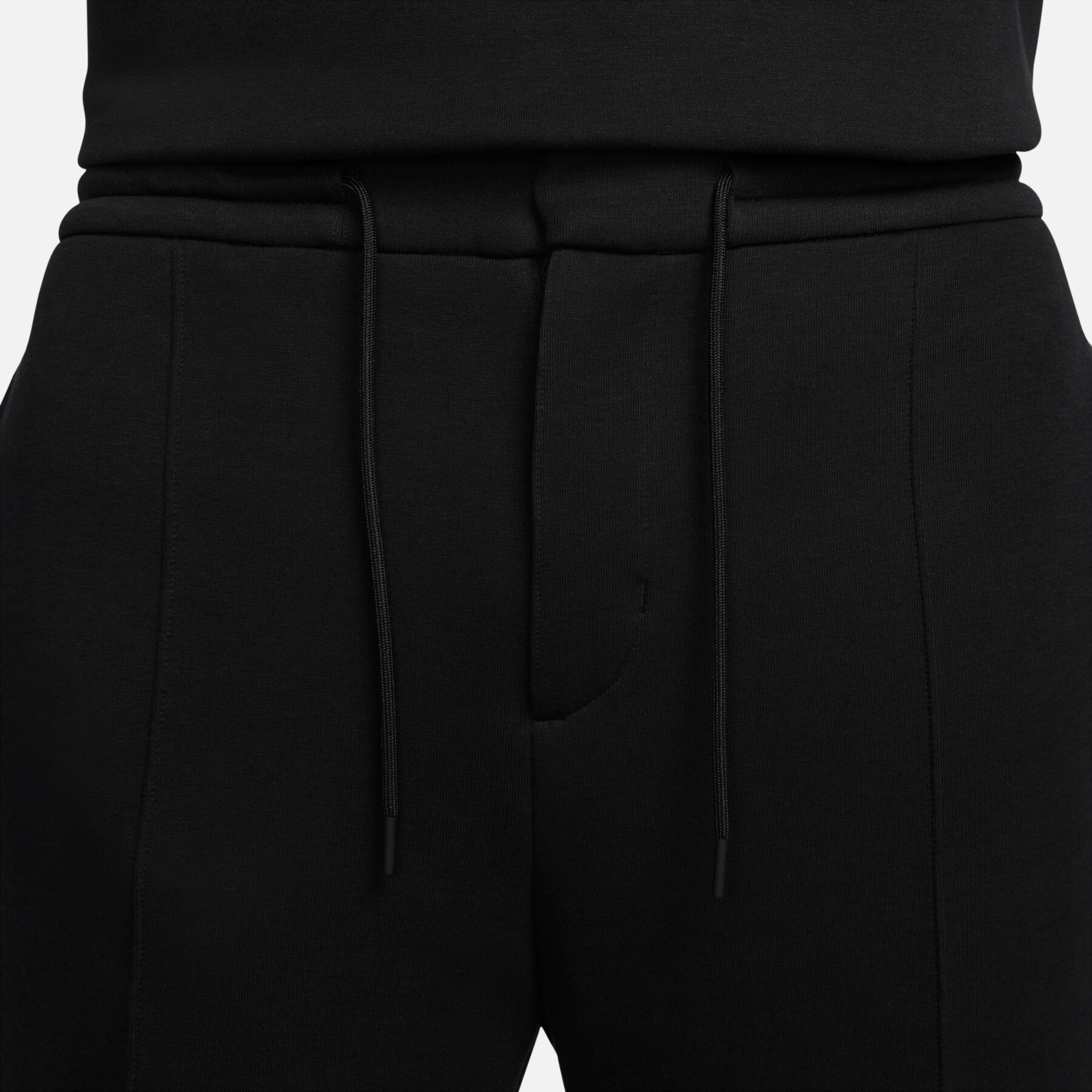 Lockere Jogginghose mit offenem Saum Nike Tech Fleece Reimagined